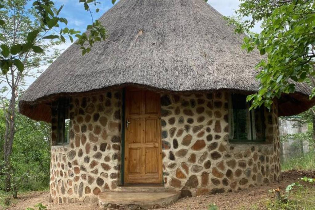 Bungalow 1 on this world renowned Eco site 40 minutes from Vic Falls Fully catered stay - 1978 photo
