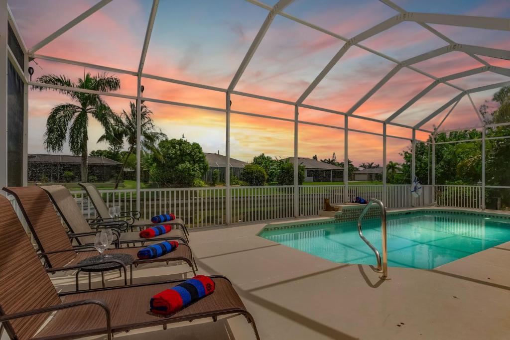 Waterfront Paradise with Heated Pool, Kayaks, & Game Room Villa Cape Paradise Roelens Vacations, Cape Coral