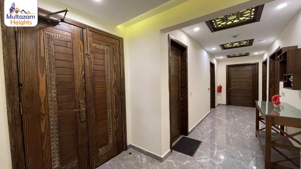 Multazam Heights, DHA Phase 8 - Three Bedrooms Family Apartments photo