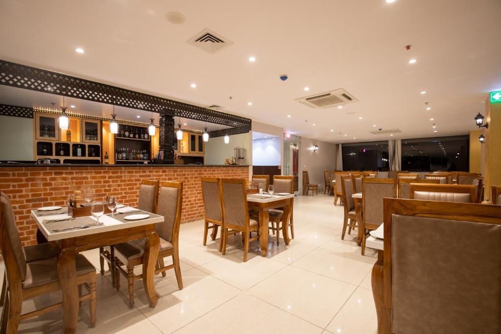 Restaurant, Hotel Palm International in Butwal