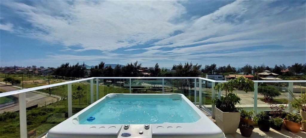 Cobertura Carpe Diem: Jacuzzi Conforto no Campeche, Florianópolis