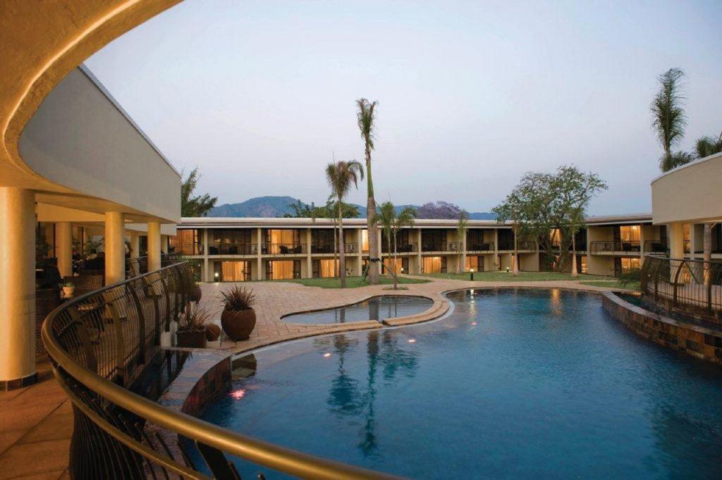 Swimming pool, Happy Valley Hotel and Casino in Lobamba