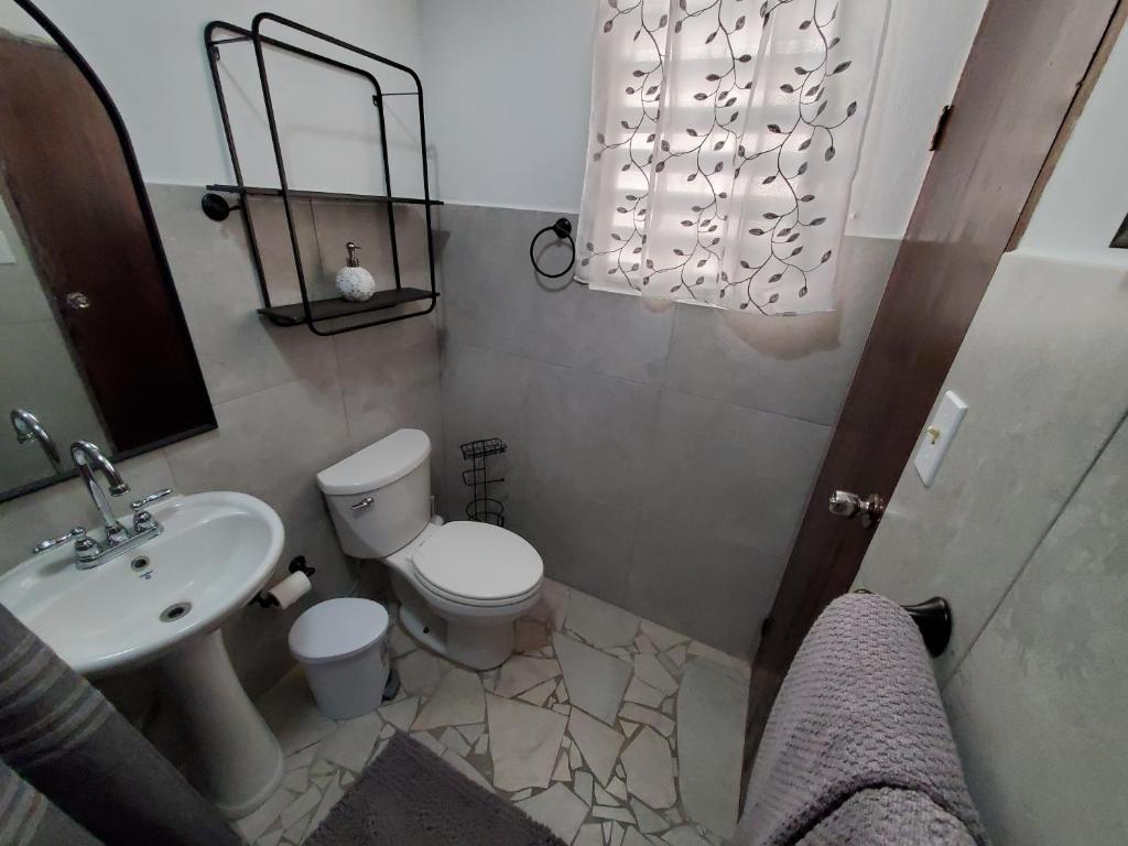 Aguadilla Surfers Lair apt with electricity water AC Wifi 8 minute walk to Crashboat beach photo