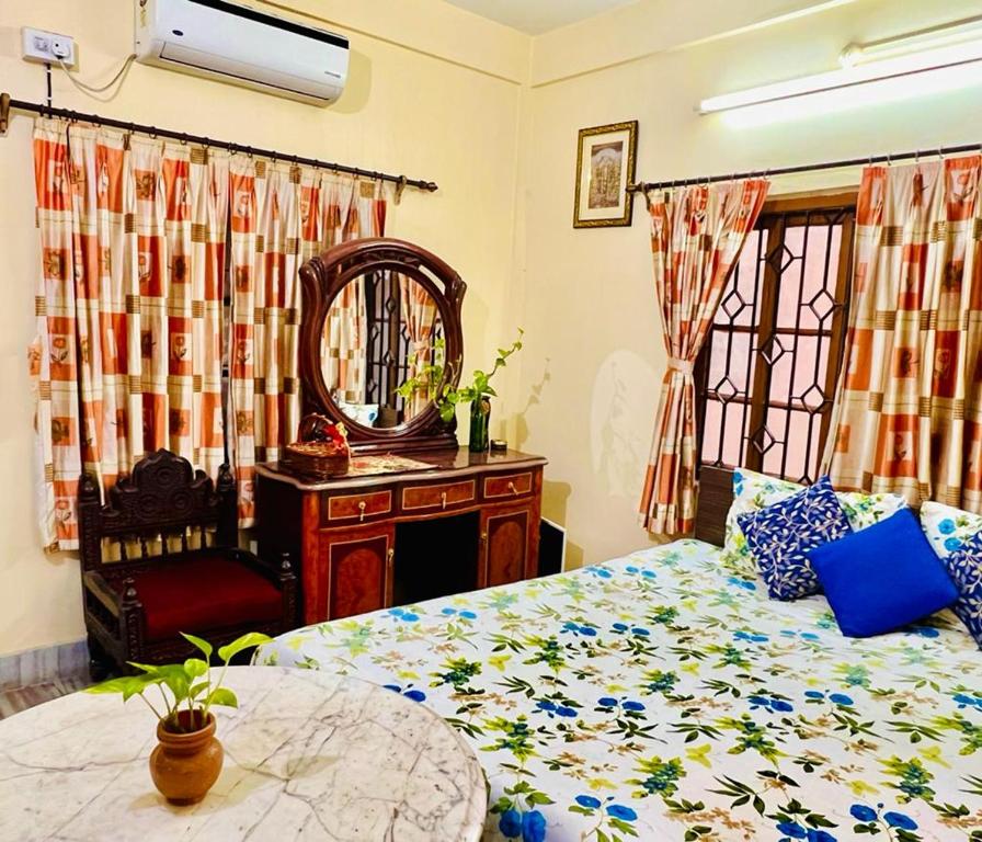 Spacious apt with Antique Furniture ,AC &amp; Kitchen — Hotel in Kolkata