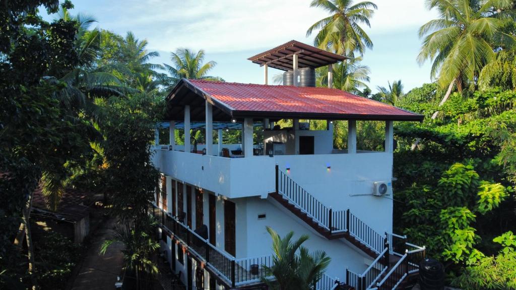 Rainbow Guest House — Hotel in Hikkaduwa