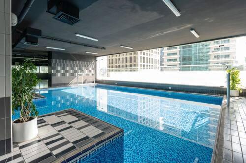 Private rooms in 3 bedroom apartment SKYNEST Homes marina pinnacle photo