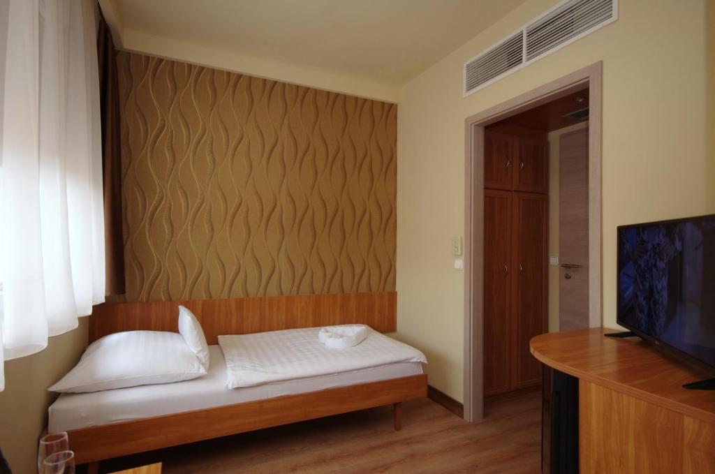 ห้องมาตรฐานเตียงใหญ่หรือเตียงแฝด