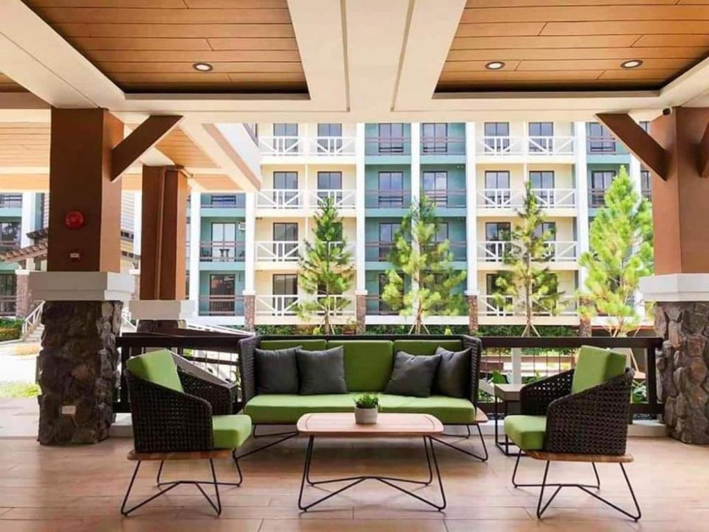 Cozy Condo at Pine Suites Tagaytay with WIFI Netflix & Pool photo
