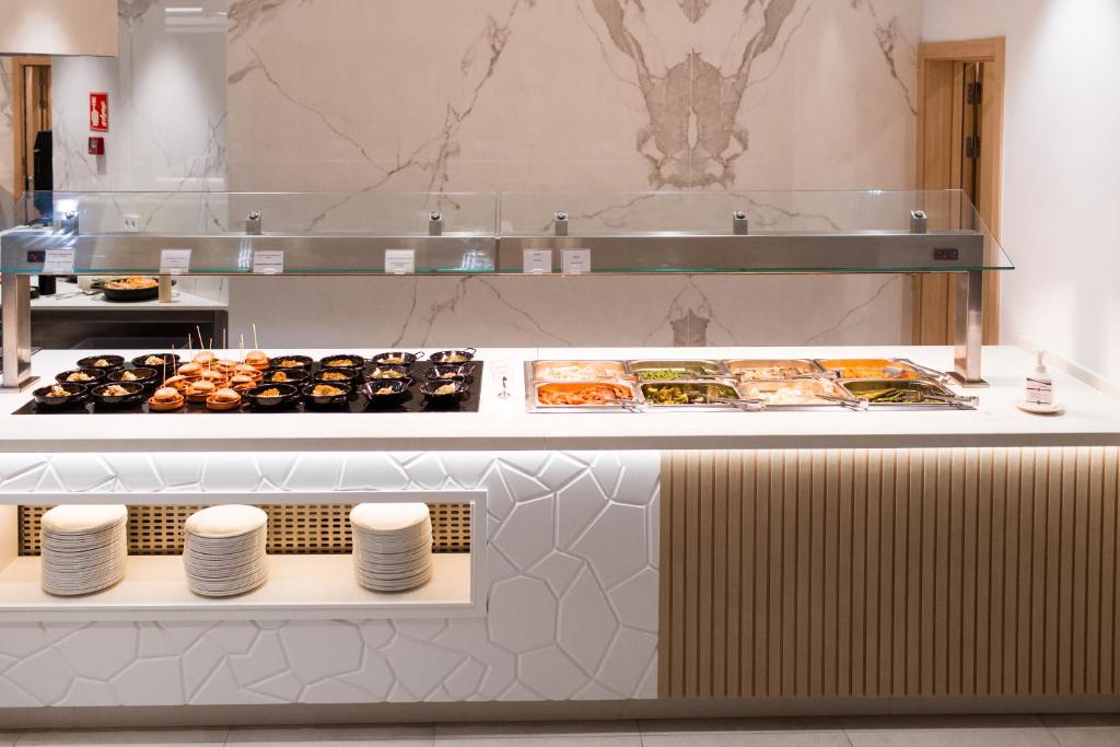 Gran Sagitario — Restaurant & bars in Santandria, Balearic Islands