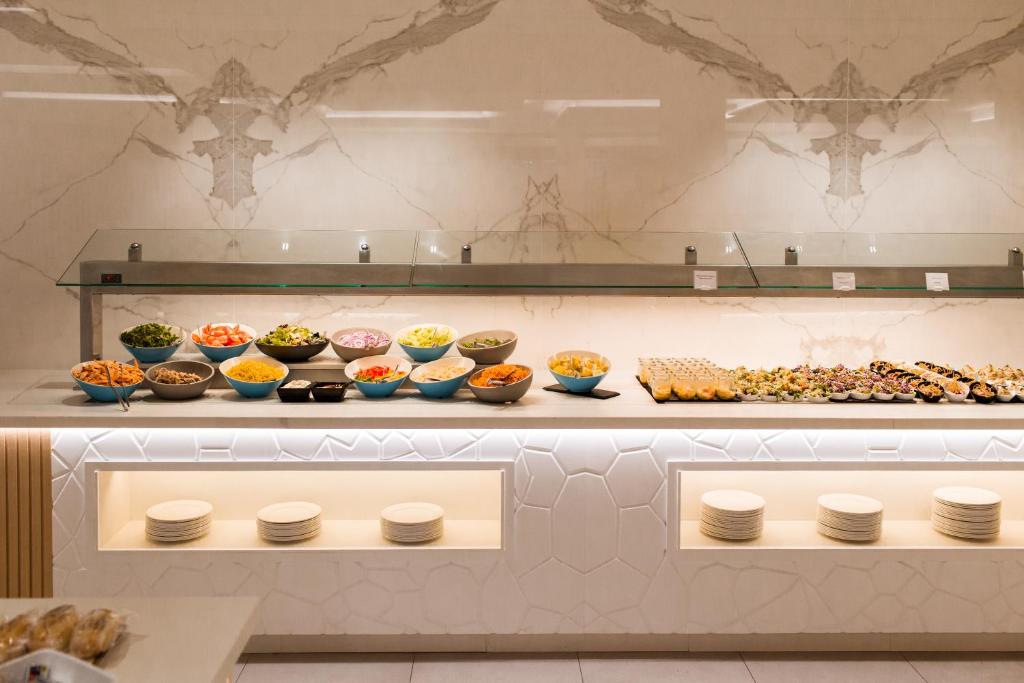 Gran Sagitario — Restaurant & bars in Santandria, Balearic Islands