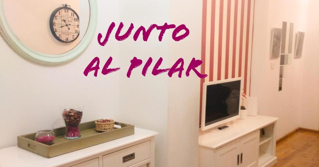 JUNTO AL PILAR - 1