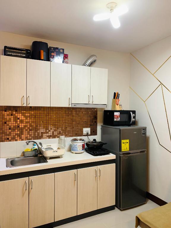라푸라푸 시티의 스튜디오 아파트먼트 27m² 프라이빗 욕실 1개 Quayside Condo near Mactan Cebu Int'l Airport 전경