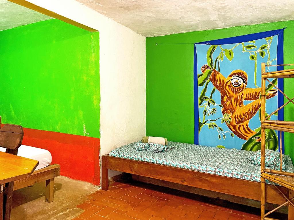 Habitación triple económica con baño compartido