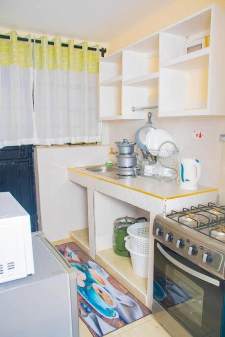 Mbelenzi Heights 1BR unit in Tassia photo