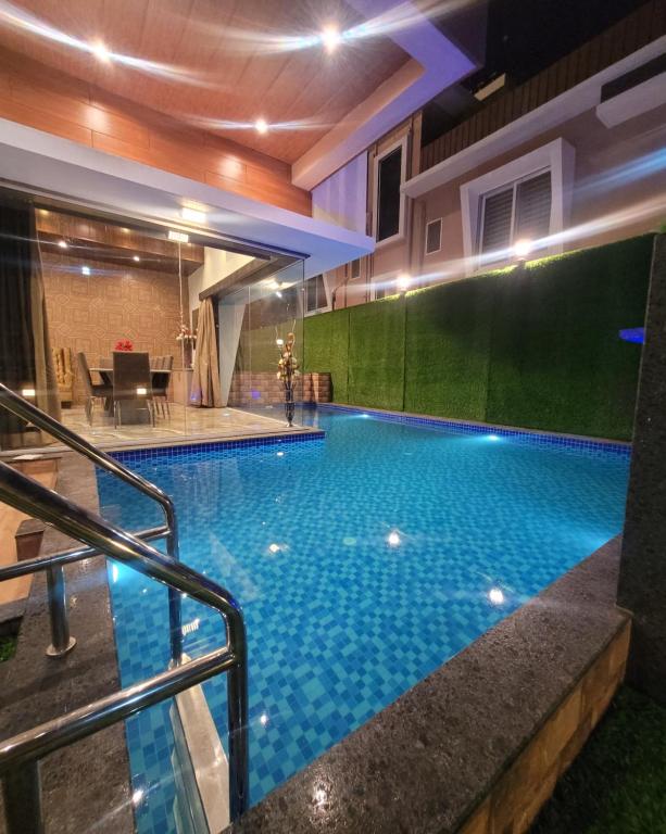 MOUNT RESORTS LONAVALA 5 BHK LUXURIOUS VILLA WITH PRIVATE POOL AND FULL SIZE CRICKET FOOTBALL TURF photo