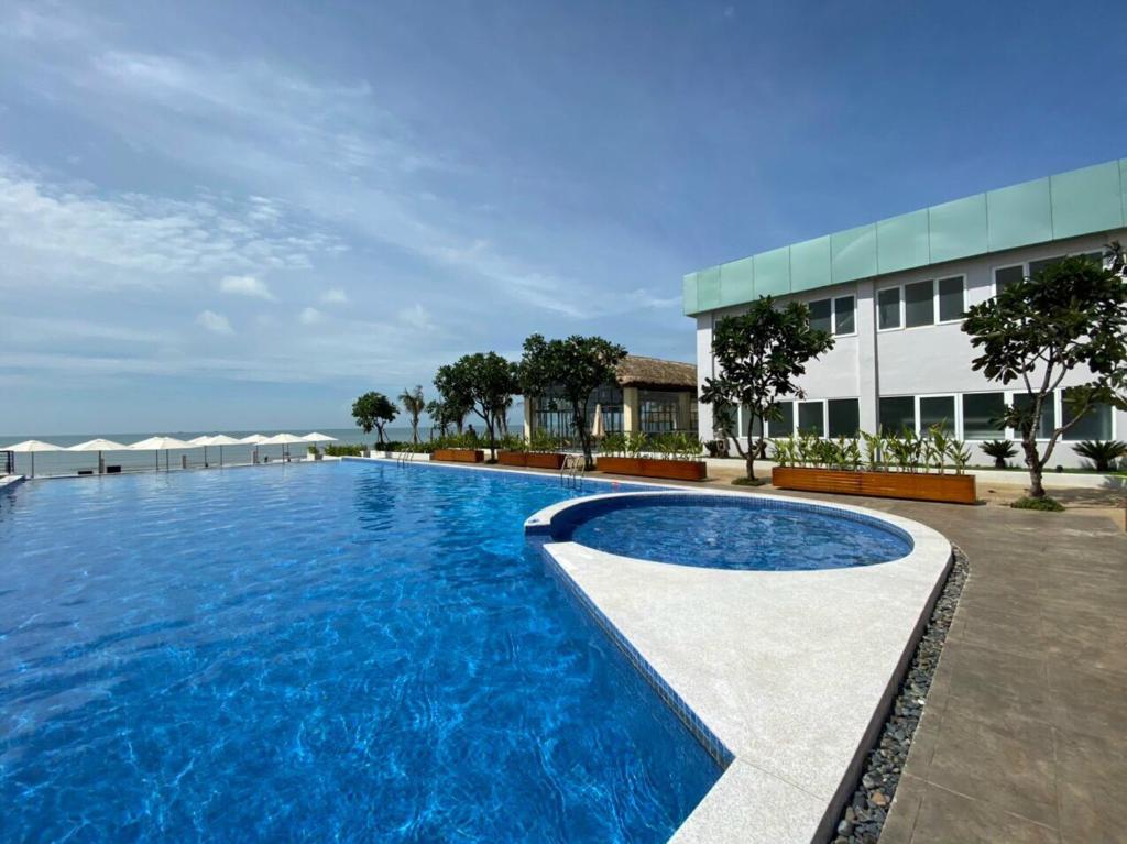 Aria Resort, Relax by sea, Ho boi va bai tam rieng mien phi, đi bo 30m ra bien photo