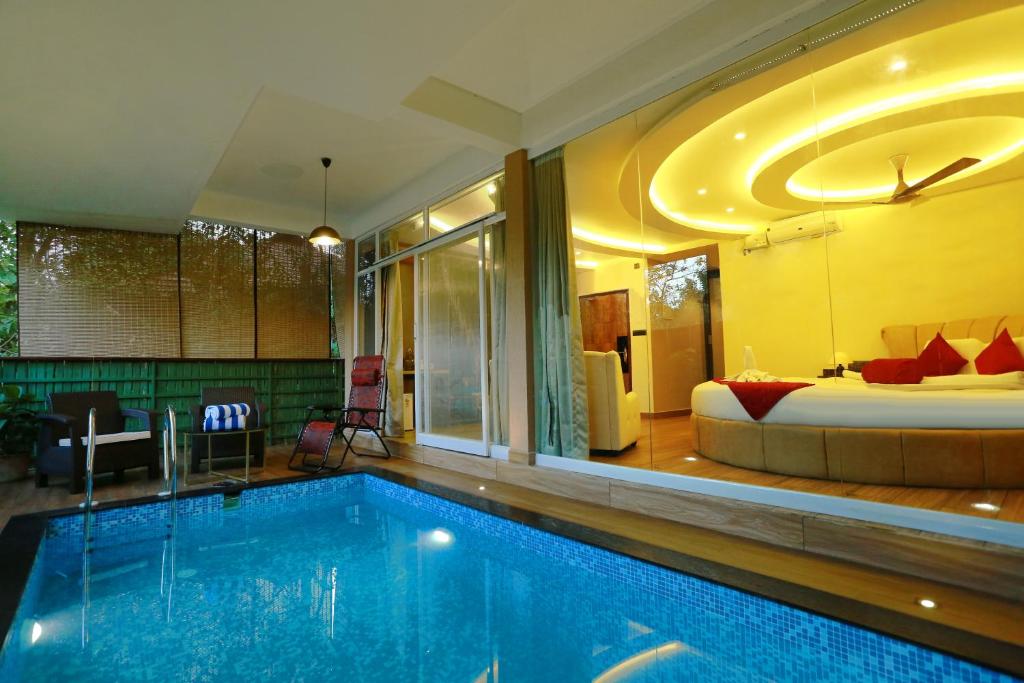 Swimming pool, Kuruva Island Resort And Spa in Wayanad