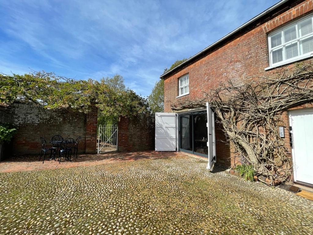 3 The Coach House One of Four Flats Available