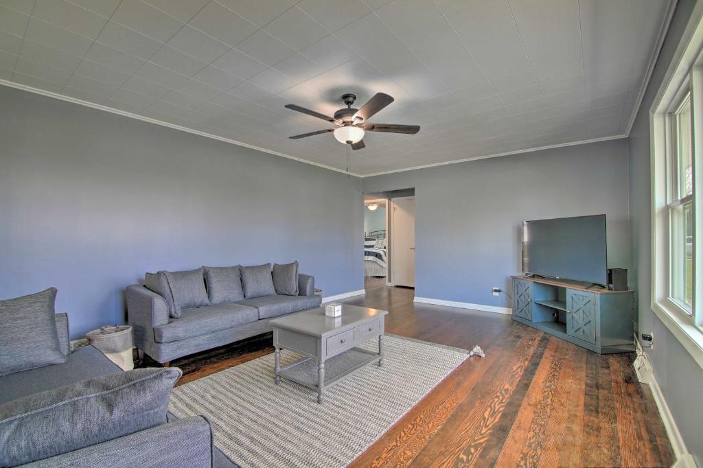 Cottage with Sunroom and Fire Pit, Walk to Lake!