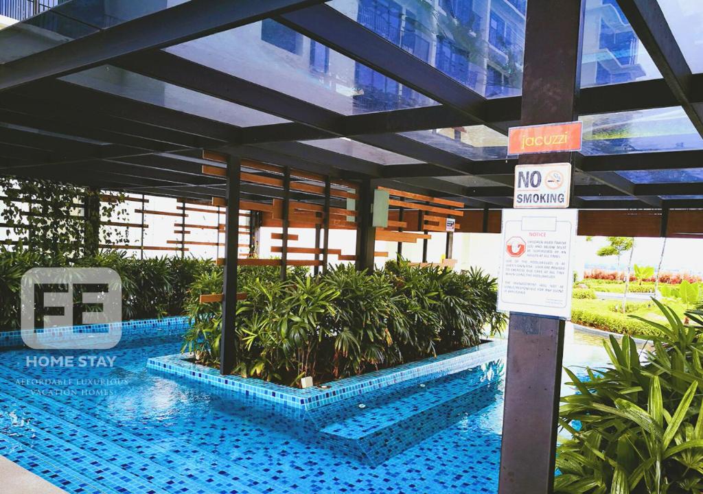 Swimming pool, Netflix WiFi Cozy Homestay Trefoil Setia Alam Shah Alam in Shah Alam