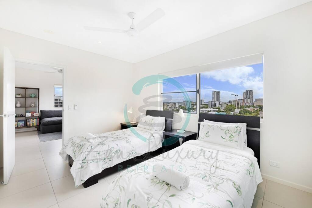 ZEN LUXURY: 2-Story 4-BR Penthouse in Darwin City with Mindal Markets & Harbour Views photo