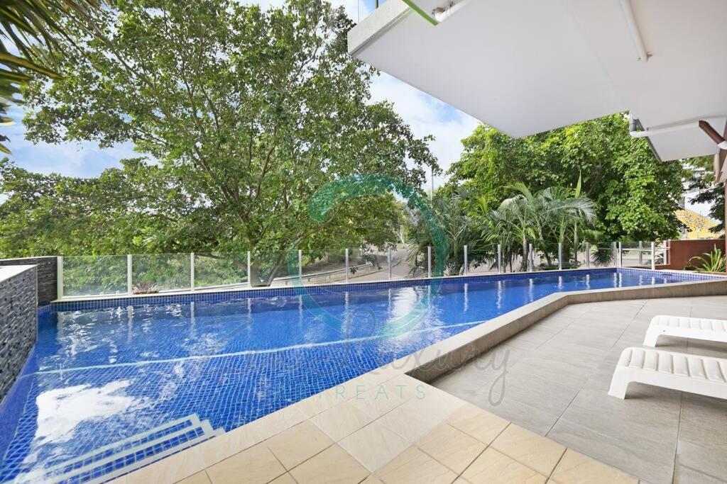 ZEN LUXURY: 2-Story 4-BR Penthouse in Darwin City with Mindal Markets & Harbour Views photo