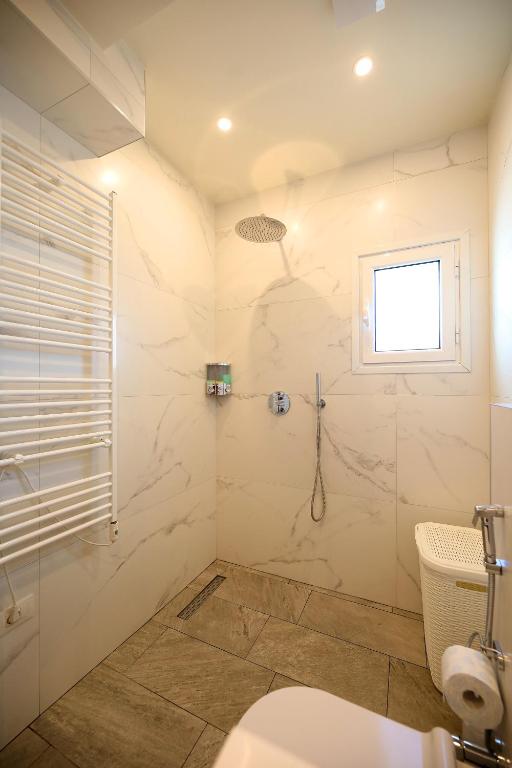 On the Beach (literally) stylish apartment with free P photo