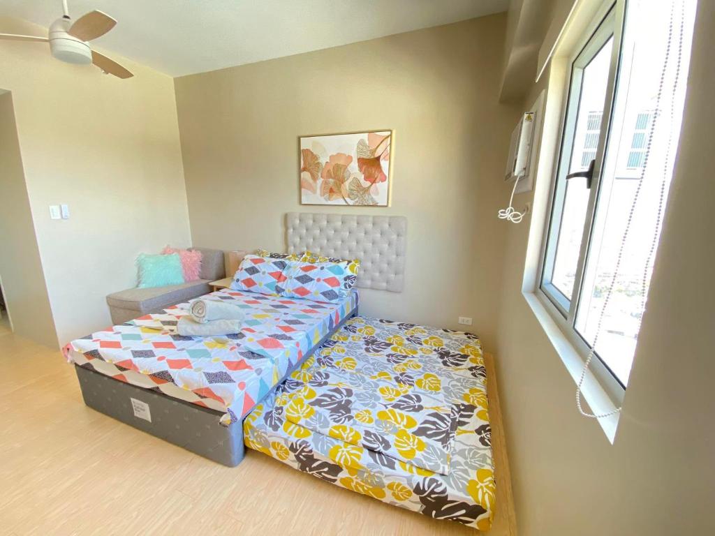 Sunvida Condo across SM City Cebu w/ WIFI and View photo