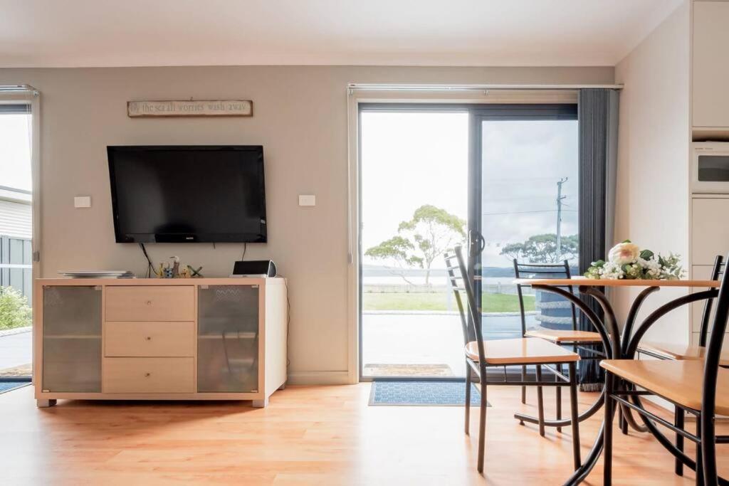 Simple Coastal Retreat In St Helens With Water Views! photo