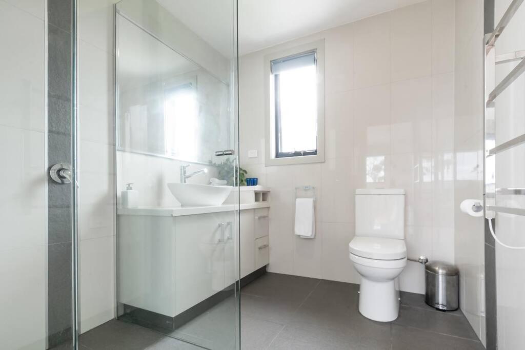 Simple Coastal Retreat In St Helens With Water Views! photo