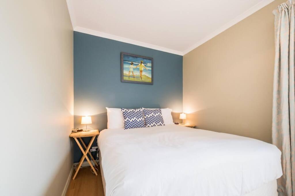 Simple Coastal Retreat In St Helens With Water Views! photo