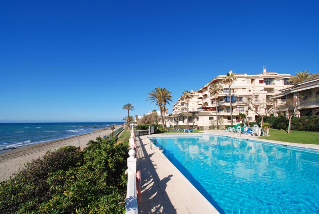Beachfront Apartment with Pool, Padel & Private Parking - 1
