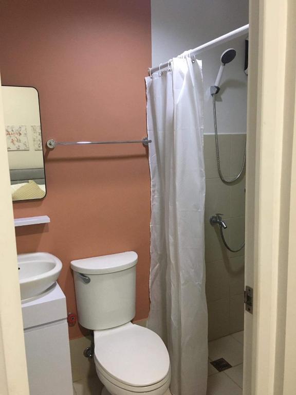 Lovely 2- BR Condo (Fully Air-conditioned w/ Wifi) photo