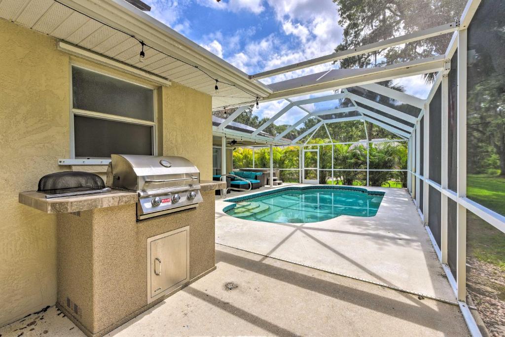 Modern Home with Screened-In Pool 4 Mi to the Beach photo