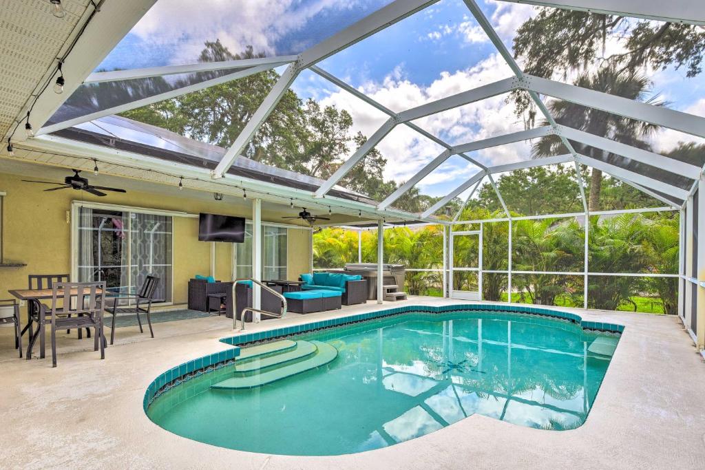Modern Home with Screened-In Pool 4 Mi to the Beach photo