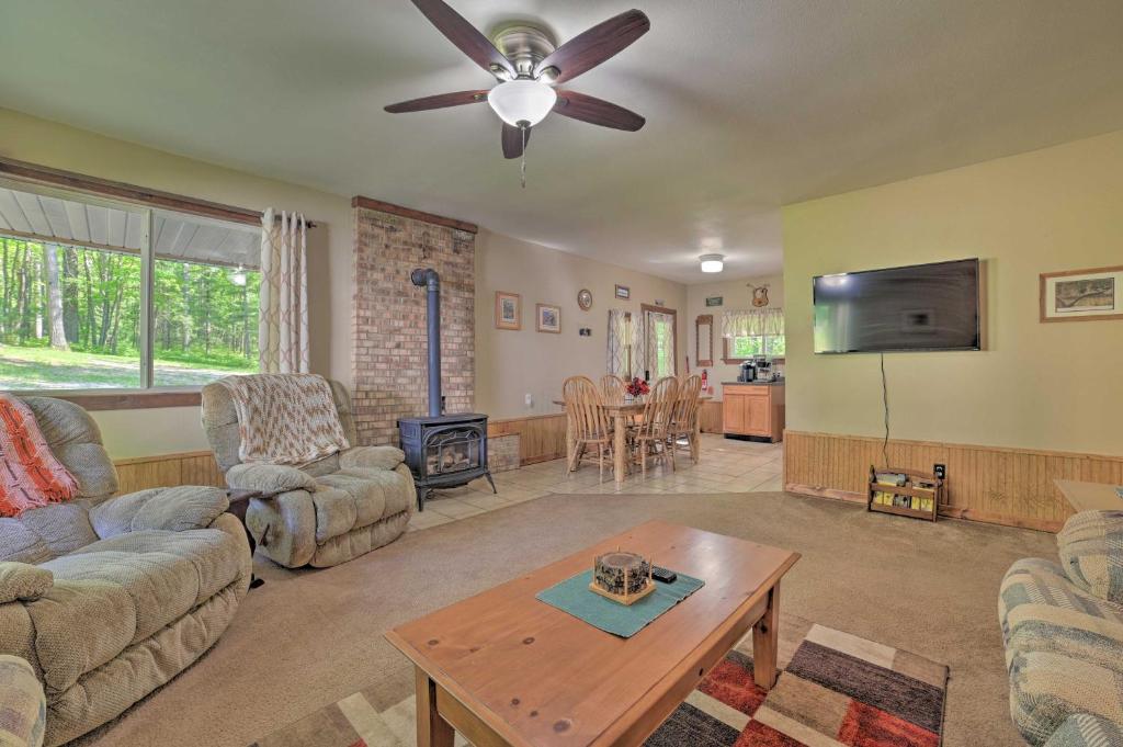 Rustic Wooded Retreat with Fire Pit, Near Trails!