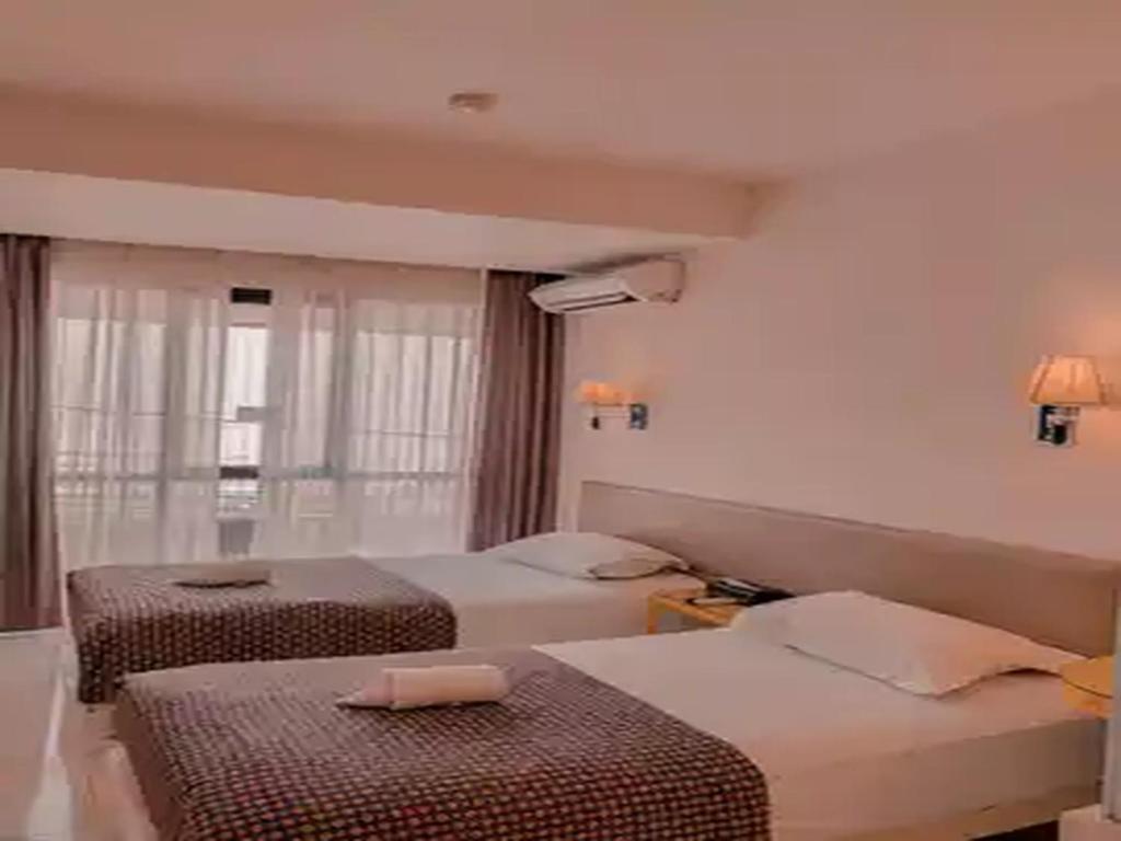 Dewarna Hotel Arifin