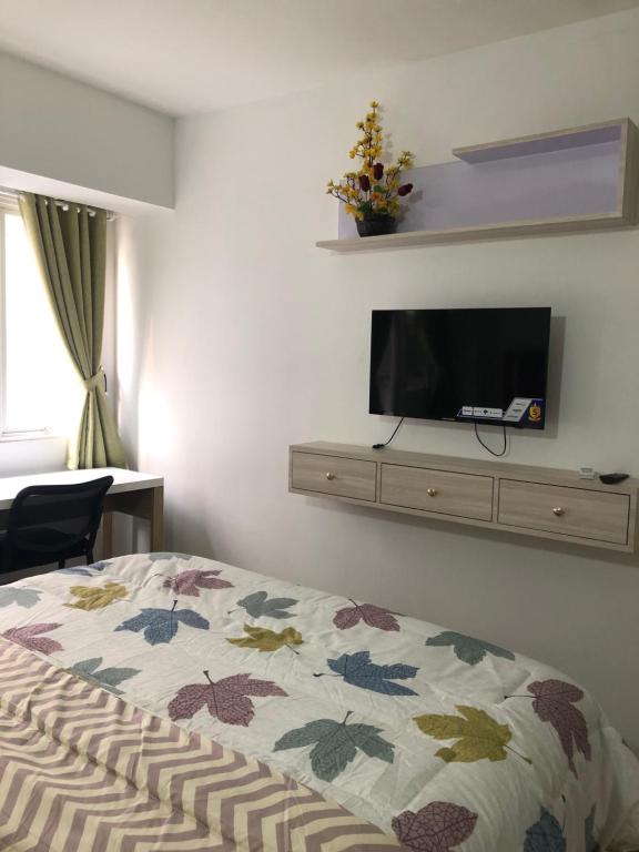 Laguna Room- Apartemen  Sentraland Karawang  A photo