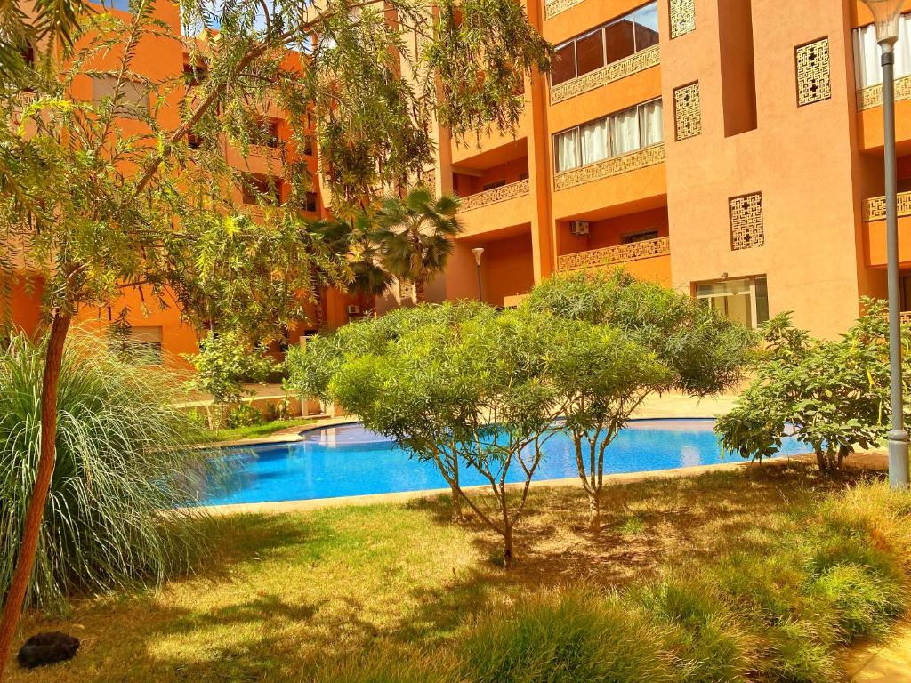 Superbe appartement en résidence avec piscines, Marakéš