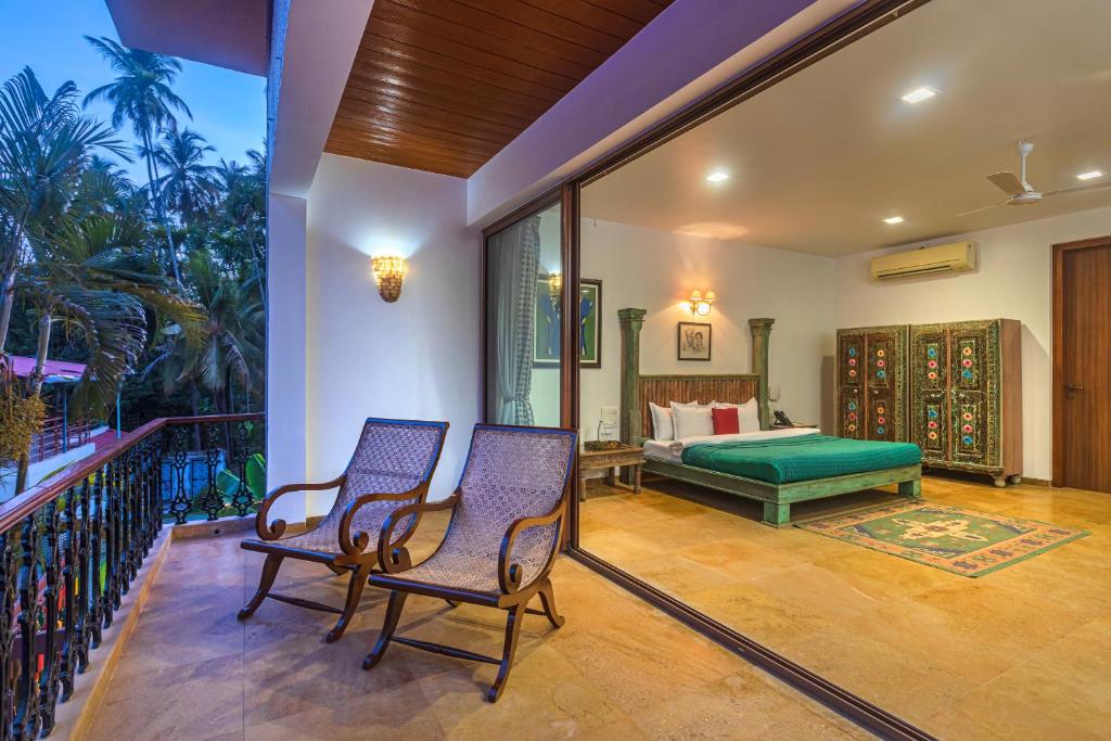 Saffronstays Casa Del Palms, Alibaug - luxury pool villa with chic interiors, alfresco dining and is photo