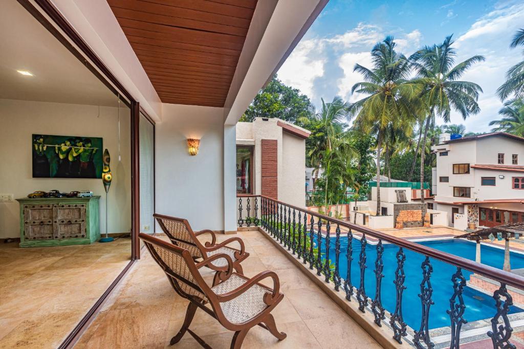 Saffronstays Casa Del Palms, Alibaug - luxury pool villa with chic interiors, alfresco dining and is photo