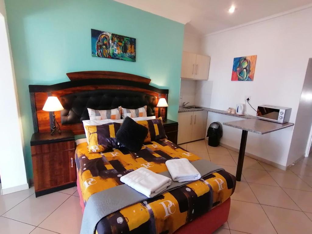Double room with kitchenette at Palm View Guest House