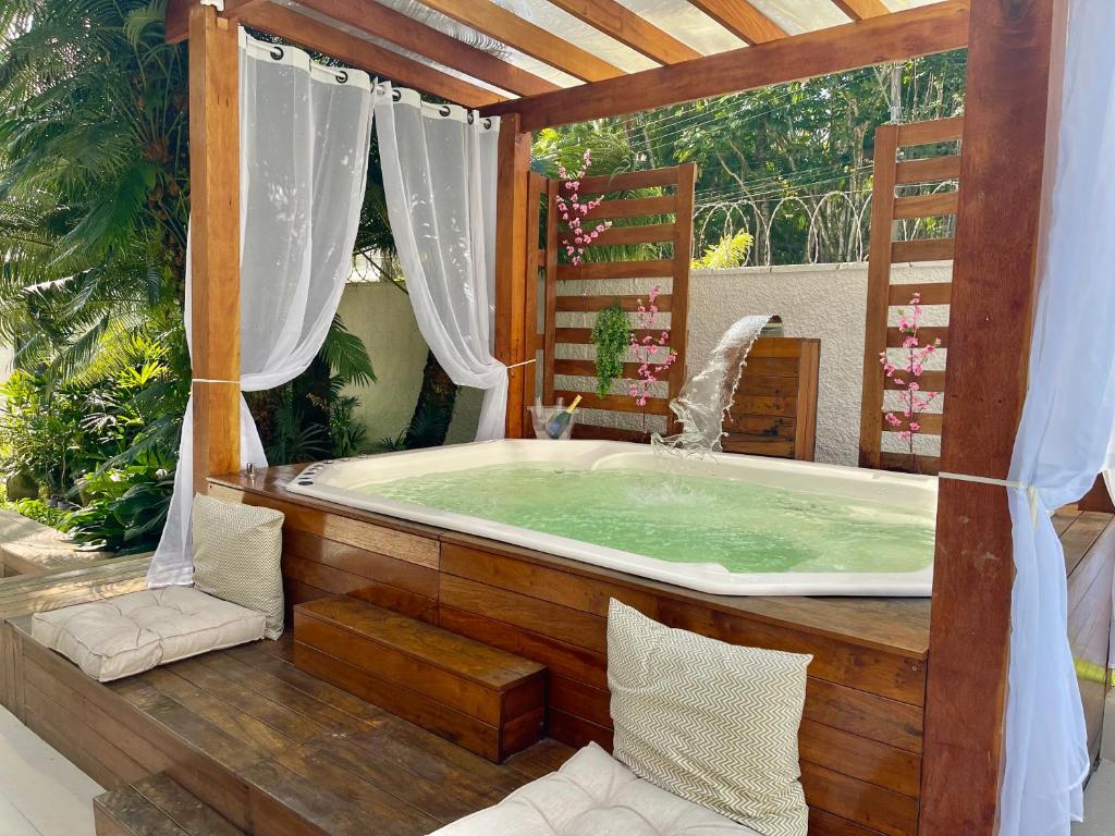 Vila linda com SPA e Piscina a 50 metros da Praia