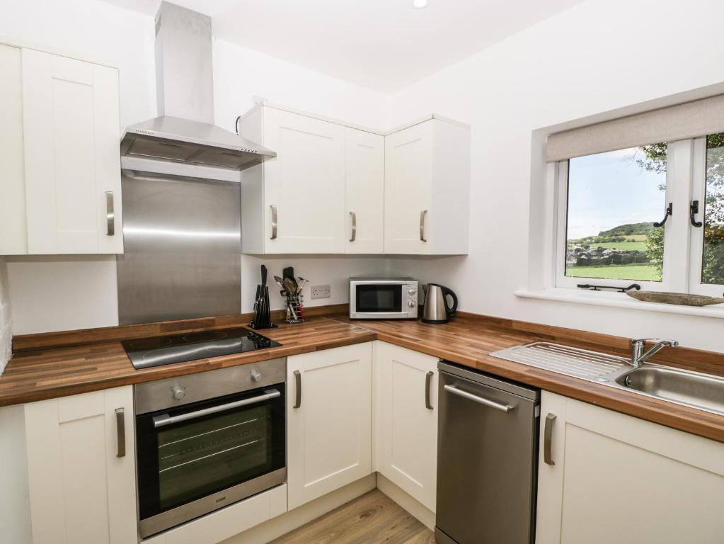 The Old Kennels, Sidmouth (Farm Conversion) photo 4