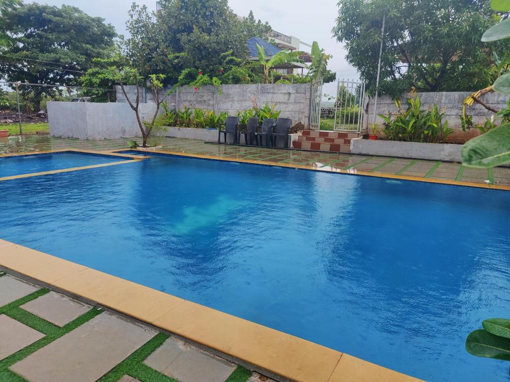 JenJon Best Retreat Chalets at Sparsh Karjat Resort with optional SWIMMING POOL photo
