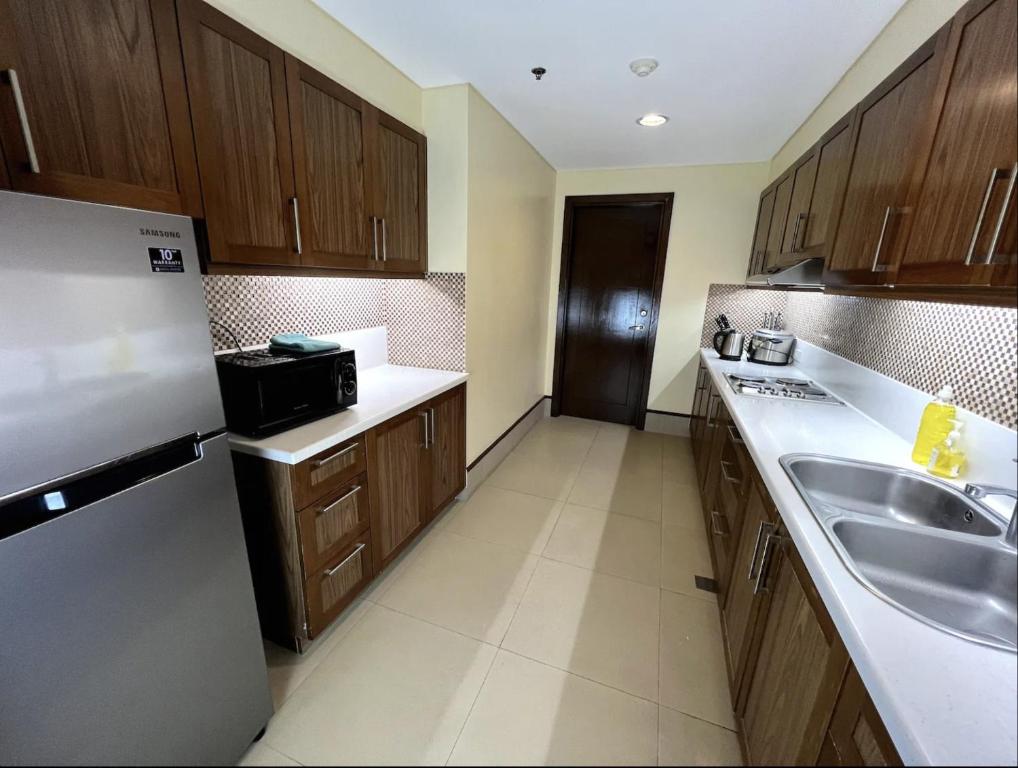 Kitchen, Anvaya Cove Short Term Rental Condos in Bataan