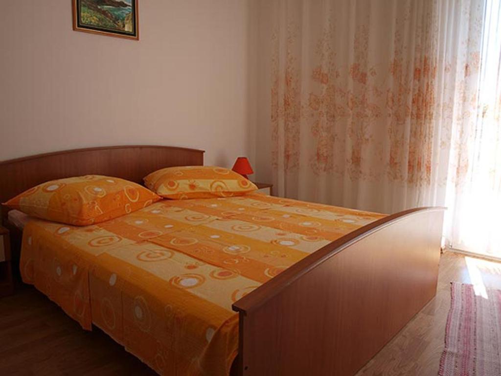 Apartments with a parking space Lopar, Rab - 16389 photo
