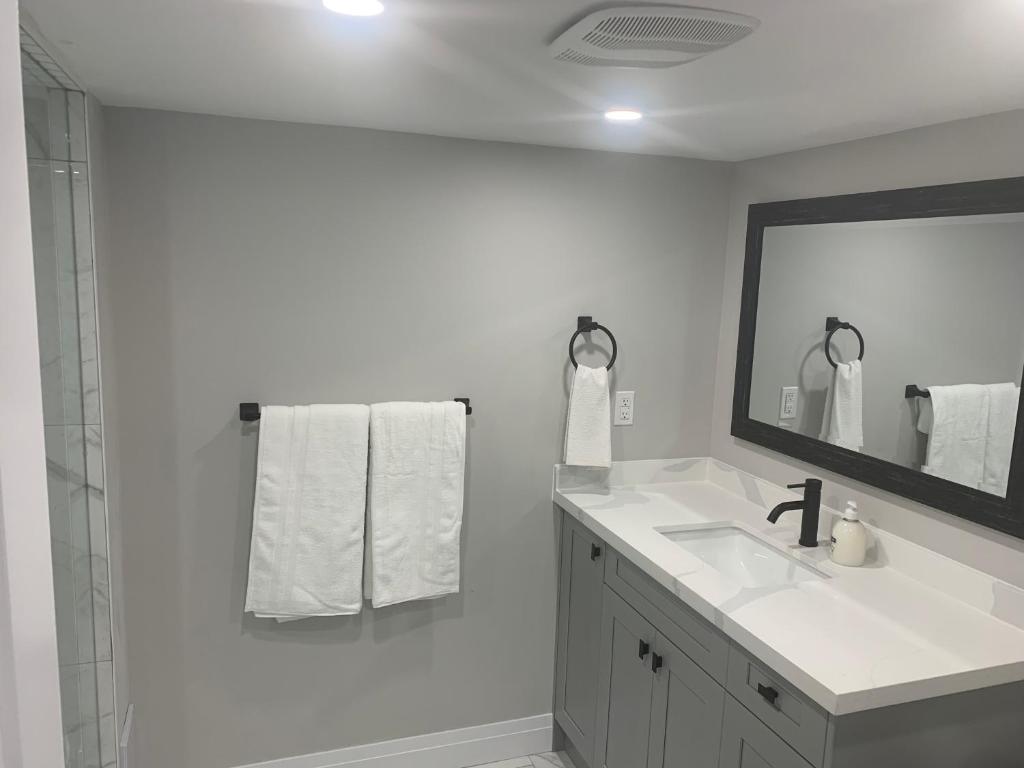 Cozy basement suite exuding Luxury Location & Convenience! photo