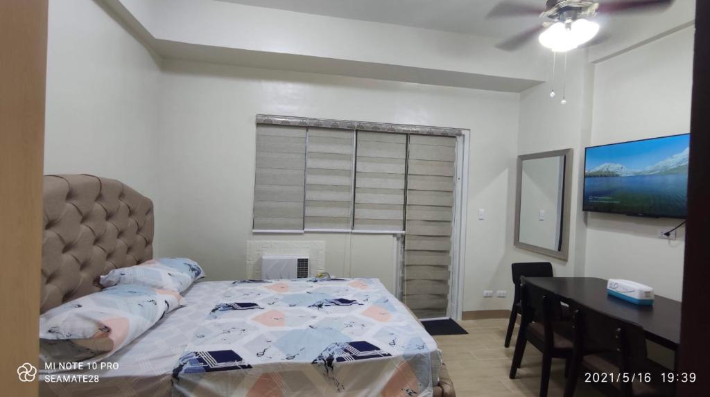 Iloilo Staycation with a Pool, Gym and Playroom photo
