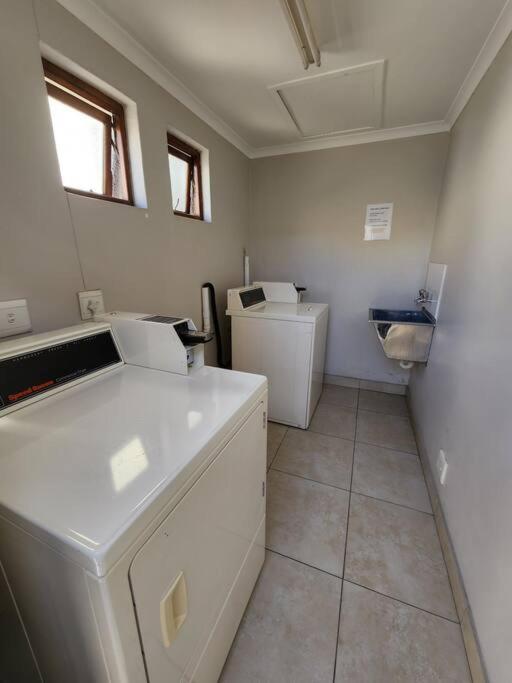 Lovely studio apartment with a pool and parking photo
